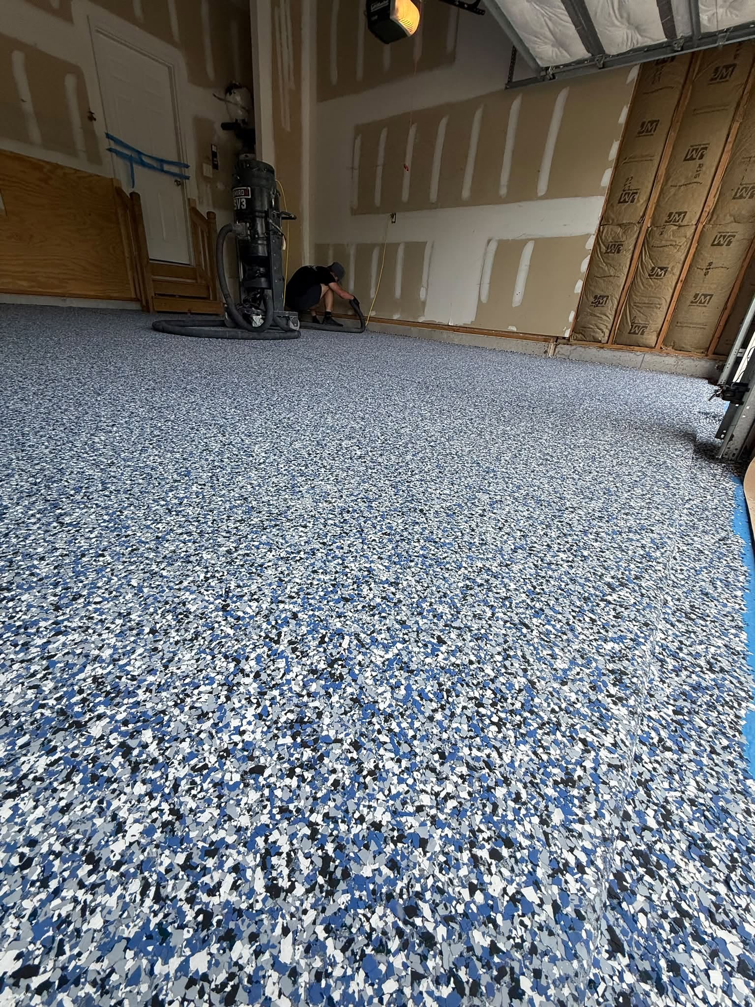 Freshly applied epoxy floor coating with glossy finish